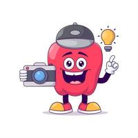 personnage de mascotte de dessin animé de poivron rouge photographe vecteur