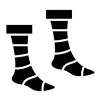 icône de glyphe de chaussettes vecteur