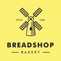 il s'agit d'un logo pour boulangerie ou boulangerie représentant un moulin à vent de couleur noire. il a l'air net dessiné sur fond jaune.