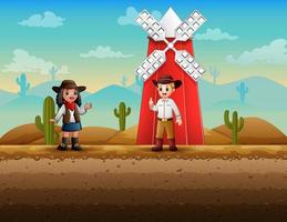 un moulin à vent rouge et un cow-boy dans le désert vecteur
