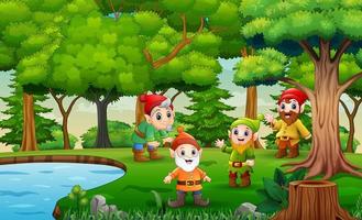 groupe de dessin animé de gnome jouant au bord de l'étang vecteur