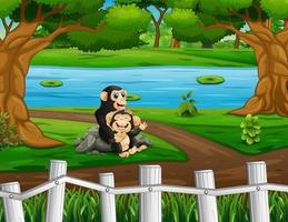 chimpanzé de dessin animé avec son petit dans le zoo ouvert vecteur