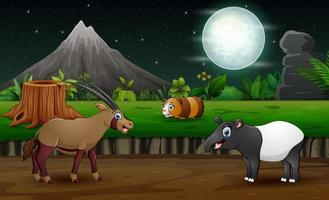 animaux sauvages de dessin animé jouant dans le paysage nocturne vecteur