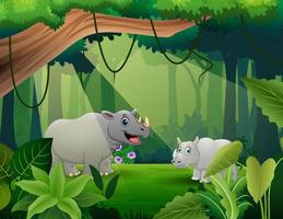 dessin animé de rhinocéros vivant dans l'illustration de la jungle vecteur