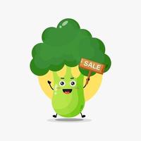 joli personnage de brocoli avec signe de vente vecteur
