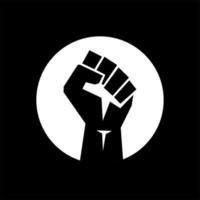 logo du poing levé. icône de vecteur de poing noir levé. victoire, symbole rebelle en signe de protestation ou symbole de geste d'émeute.