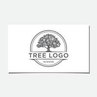 création de logo d'arbre vintage en cercle vecteur