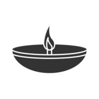 icône de glyphe de lampe à huile islamique. diya. culture islamique. lampe à huile à bol brûlant. symbole de la silhouette. espace négatif. illustration vectorielle isolée vecteur