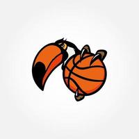 logo illustration mascotte de toucan avec illustration de ballon de basket vecteur