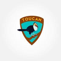 logo illustration mascotte de toucan avec bouclier vecteur