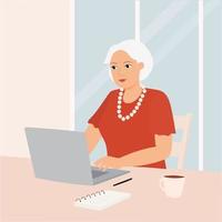 une mamie d'affaires avec un ordinateur portable. une femme âgée heureuse travaille, communique, regarde des vidéos. vecteur