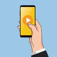 main humaine de style design plat tenant un smartphone avec une application multimédia en ligne à l'écran, élément de conception vectorielle que j'isole sur fond bleu vecteur