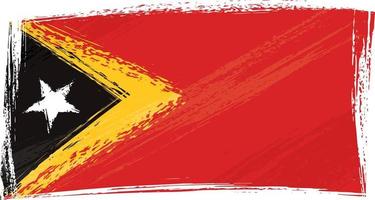 drapeau national du timor oriental créé dans un style grunge vecteur