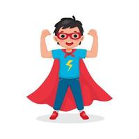mignon petit garçon jouant vêtu de costumes de super-héros debout levant les mains montrant des bras forts vecteur
