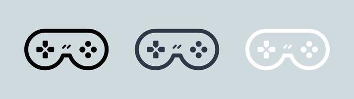 icône de la console de jeu ou du joystick dans les couleurs noir, gris et blanc. jeu d'icônes de ligne de manette de jeu. vecteur