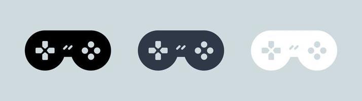 icône de la console de jeu ou du joystick dans les couleurs noir et blanc. jeu d'icônes plates de manette de jeu.