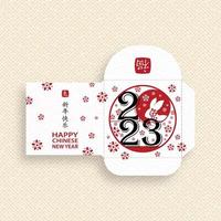 nouvel an chinois 2023 paquet d'argent enveloppe rouge chanceux pour l'année du lapin vecteur