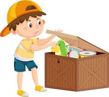 un garçon mettant son jouet dans la boîte vecteur