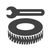 icône noire de glyphe de réparation de pneu vecteur