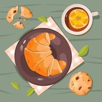 petit-déjeuner avec un croissant et une tasse de thé au citron sur la table. petit déjeuner traditionnel français. illustration vectorielle vecteur