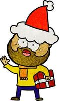 dessin animé texturé d'un homme barbu avec un présent portant un bonnet de noel vecteur