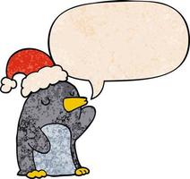 pingouin de noël dessin animé mignon et bulle de dialogue dans un style de texture rétro vecteur