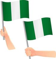 drapeau nigéria dans l'icône de la main vecteur