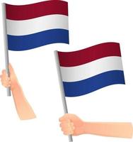 drapeau néerlandais dans l'icône de la main vecteur