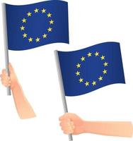drapeau de l'ue europe dans l'icône de la main vecteur