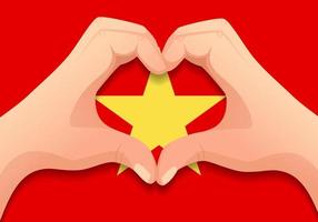 drapeau vietnam et forme de coeur à la main vecteur