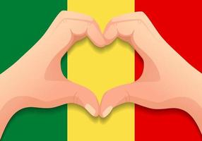 drapeau du mali et forme de coeur à la main vecteur