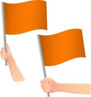 drapeau orange dans l'icône de la main vecteur