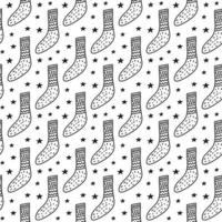 modèle sans couture noir et blanc avec des chaussettes et des étoiles de contour de doodle. vecteur