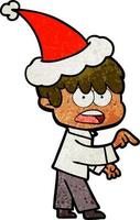 caricature texturée inquiète d'un garçon portant un bonnet de noel vecteur