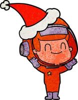 heureux dessin animé texturé d'un homme astronaute portant un bonnet de noel vecteur