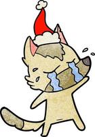 dessin animé texturé d'un loup qui pleure portant un bonnet de noel vecteur