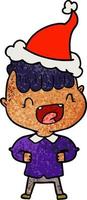 dessin animé texturé d'un garçon heureux riant portant un bonnet de noel vecteur