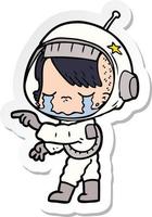 autocollant d'une fille astronaute en pleurs de dessin animé vecteur