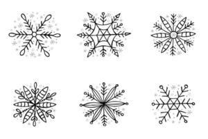 un ensemble de flocons de neige dessinés à la main. illustration vectorielle dans un style doodle. humeur d'hiver. bonjour 2023. joyeux noël et bonne année. éléments noirs et gris sur fond blanc. vecteur