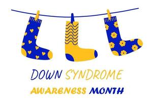 vecteur de concept de mois de sensibilisation au syndrome de down dans les couleurs bleues et jaunes. les chaussettes sont suspendues à une corde comme symbole d'une maladie génétique.