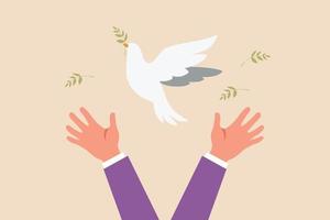 colombe blanche volante à la main le jour international de la paix. concept de jour de la paix. illustration vectorielle graphique plat coloré. vecteur