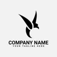 création de logo d'oiseau volant icône vecteur