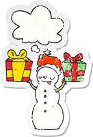 bonhomme de neige dessin animé avec bulle de cadeau et de pensée comme un autocollant usé en détresse vecteur