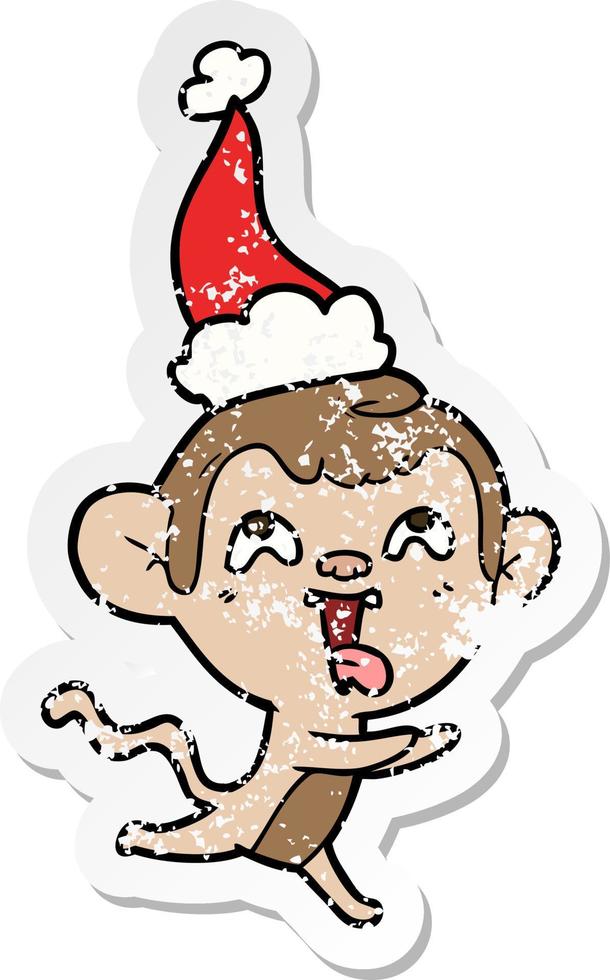 desenho de adesivo angustiado louco de um macaco correndo usando chapéu de papai noel vetor