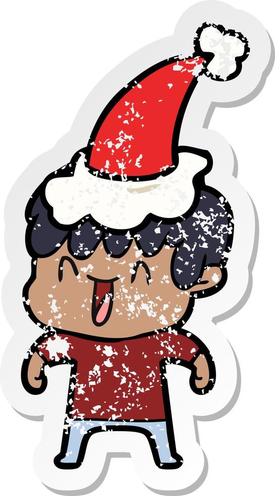 desenho de adesivo angustiado de um menino rindo usando chapéu de papai noel vetor