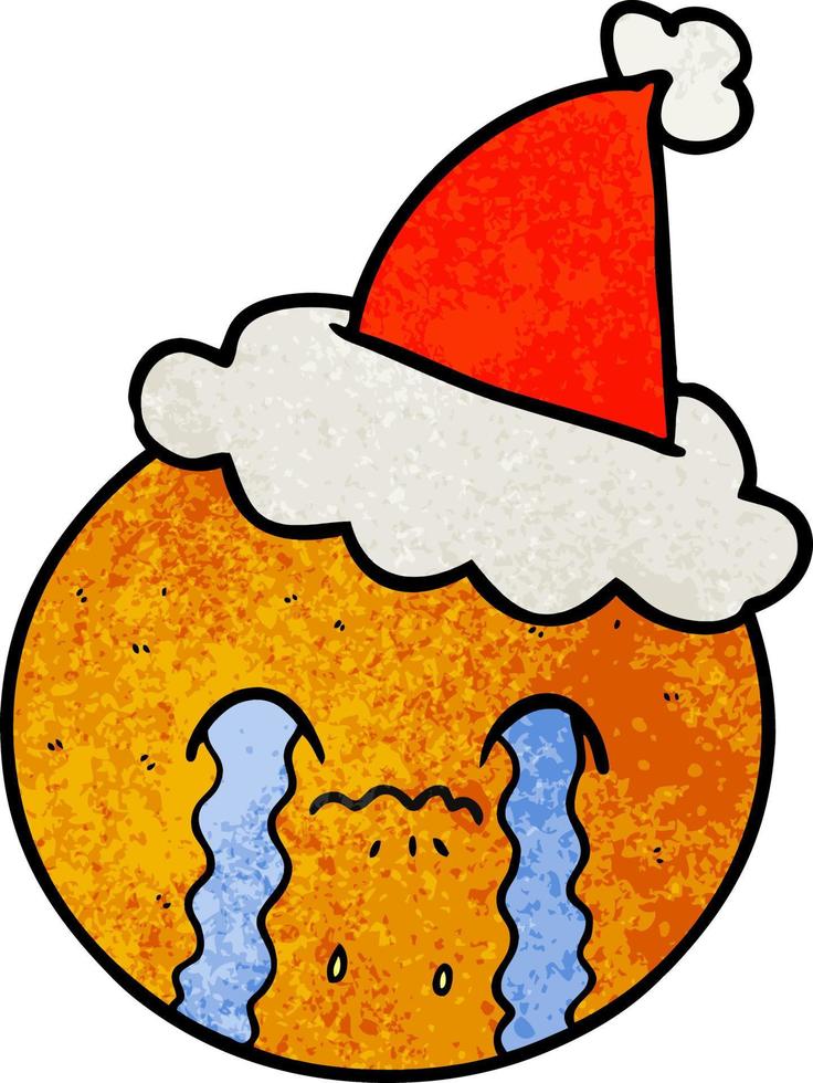 desenho texturizado de uma laranja usando chapéu de papai noel vetor