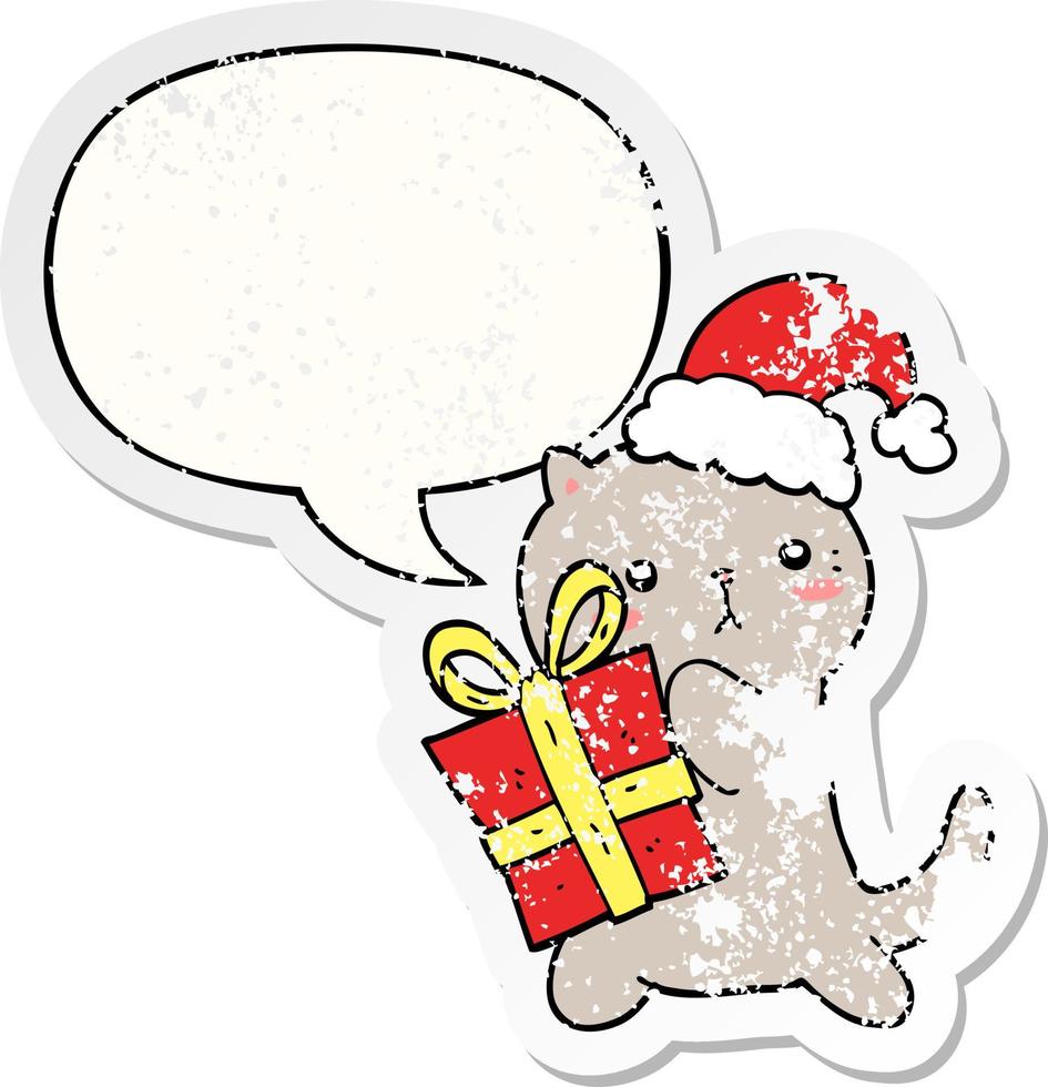 lindo gato de desenho animado carregando presente de natal e adesivo angustiado de bolha de fala vetor