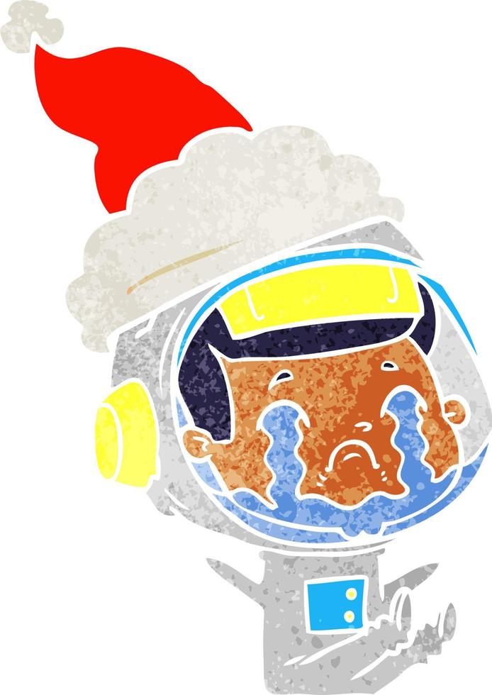 desenho retrô de um astronauta chorando usando chapéu de papai noel vetor