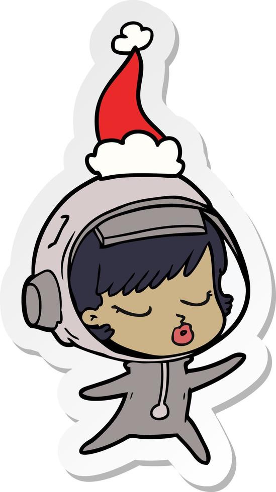 desenho de adesivo de uma linda garota astronauta usando chapéu de papai noel vetor