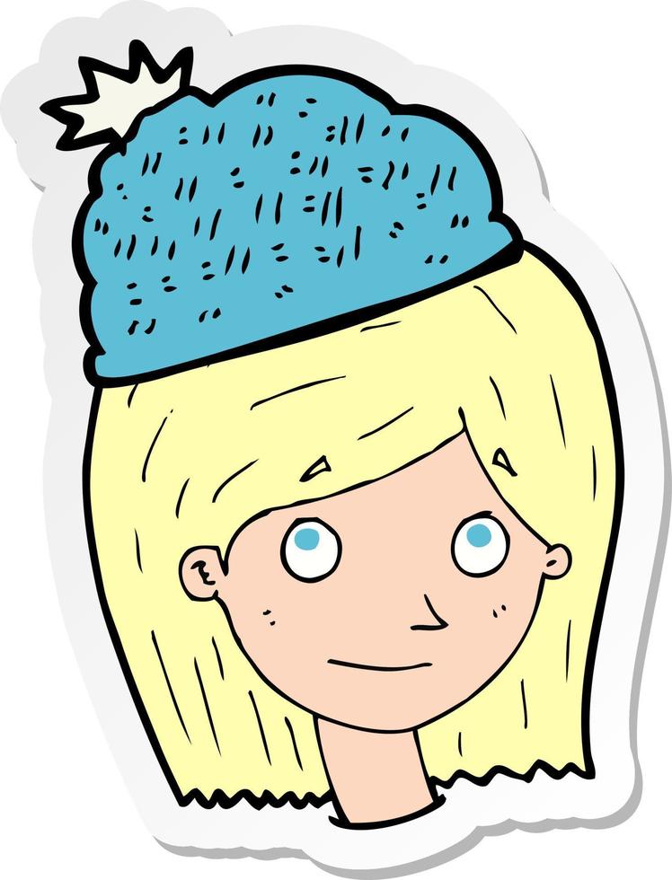 adesivo de uma mulher de desenho animado usando chapéu de inverno vetor